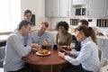 Diverse colleagues celebrate event at break drink tea eat cake Royalty Free Stock Photo