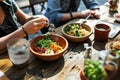 Diverse colleagues dinner meeting lunch in office restaurant businessmen group cafeteria cafe discussion business fine Royalty Free Stock Photo