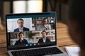 Diverse colleagues have online team meeting on laptop Royalty Free Stock Photo