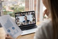 Diverse colleagues talk on video call on laptop Royalty Free Stock Photo