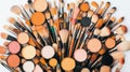 A diverse collection of makeup brushes and palettes arranged in a circular pattern. Royalty Free Stock Photo