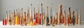 Diverse collection of wooden bodkins and textile tools displayed on table Royalty Free Stock Photo