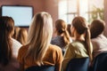 Diverse concentrated serious group of young people male female students listening speaker watching presentation Royalty Free Stock Photo