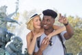 diverse couple sight-seeing together on summer holiday Royalty Free Stock Photo