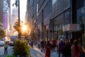 Diverse crowds of people walk down the busy sidewalks on 34th Street through Midtown Manhattan in New York City Royalty Free Stock Photo