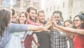 Diverse culture students stacking hands outdoor - Young happy people celebrating together - Youth, lifestyle, university,