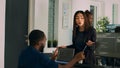 Diverse database developers doing highfive gesture with colleague programer Royalty Free Stock Photo