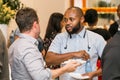 Diverse delegates networking at educational event