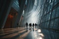 Diverse diplomats stroll through a modern architectural hall at dusk Royalty Free Stock Photo