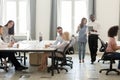 Diverse employees using computers, working together at coworking Royalty Free Stock Photo