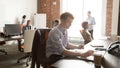 Diverse employees using, working on computers, everyday office routine Royalty Free Stock Photo