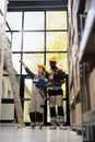 Diverse employess wearing helmet and protective overall Royalty Free Stock Photo