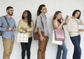 Diverse ethnic people in a line waiting Royalty Free Stock Photo