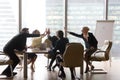 Diverse executive business team give high five in modern office Royalty Free Stock Photo