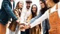 Multiracial happy young people stacking hands outside Royalty Free Stock Photo