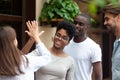 Diverse girls greeting each other giving high five Royalty Free Stock Photo