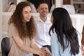 Caucasian and african women holding hands during group therapy session Royalty Free Stock Photo