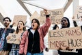 Diverse group of activists people protesting against war and violence. Royalty Free Stock Photo