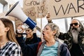 Diverse group of activists people protesting against war and violence. Royalty Free Stock Photo