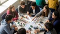 Young Diverse Students Collaborating on Robotics and STEM Project Royalty Free Stock Photo