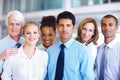 Diverse group of executives. Portrait of diverse executives smiling together at office. Royalty Free Stock Photo