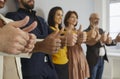 Diverse team of happy people standing in row and showing thumbs up gestures together Royalty Free Stock Photo