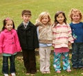 Diverse group of little kids outside Royalty Free Stock Photo