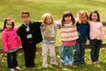 Diverse group of little kids outside Royalty Free Stock Photo