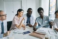 Doctors Looking at X Rays in Meeting Royalty Free Stock Photo