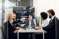 Diverse group of multiracial business people in the conference room with big TV screen, cooperating at the table, share Royalty Free Stock Photo