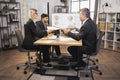 Diverse group of multiracial business people in the conference room with big TV screen Royalty Free Stock Photo