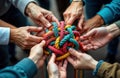 Diverse group of people collaborate to untangle complex colorful ropes. Teamwork and problem solving strategy. Unity and