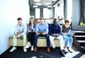 Diverse Group of People Community Togetherness Technology Sitting Concept. Royalty Free Stock Photo