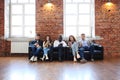 Diverse Group of People Community Togetherness Technology Sitting Concept. Royalty Free Stock Photo