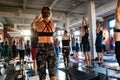 Diverse group of people in yoga class.