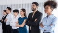 Diverse business people stand in line with cross arm gesture. Concord. Royalty Free Stock Photo