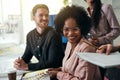 Smiling group of businesspeople working together in a modern off Royalty Free Stock Photo