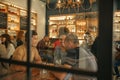 Smiling young friends sitting in a bar having drinks together Royalty Free Stock Photo