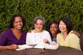 Diverse group of woman in a small group. Royalty Free Stock Photo