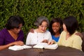 Diverse group of woman in a small group. Royalty Free Stock Photo