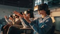 Diverse group of young people wearing VR headsets and interacting with virtual reality in a modern lecture hall, symbolizing Royalty Free Stock Photo