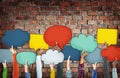 Diverse Hands Holding Colourful Speech Bubbles Royalty Free Stock Photo