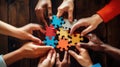 Diverse hands holding puzzle pieces that fit together to form a larger puzzle, depicting the idea that unique skills combine to