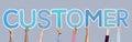 Diverse hands holding the word customer Royalty Free Stock Photo