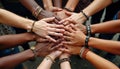 Diverse hands interlocked display unity, harmony. People of various ethnicities join hands togetherness, acceptance. Hands show