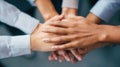 Diverse hands stacking together, symbolizing unity, teamwork, and strong support in a collaborative group Royalty Free Stock Photo