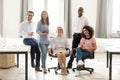 Diverse happy staff employees group posing for portrait in office Royalty Free Stock Photo