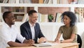 Diverse hr managers laughing listening to african applicant at interview Royalty Free Stock Photo