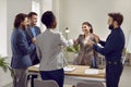 HR manager shaking hands with happy young woman after her successful job interview Royalty Free Stock Photo