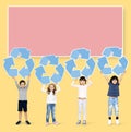 Diverse kids holding recycling icons Royalty Free Stock Photo